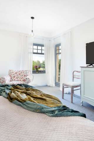 Отели типа «постель и завтрак» Kashubian Lodge & SPA Пшивидз Двухместный номер Делюкс с 1 кроватью или 2 отдельными кроватями и видом на озеро-2