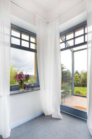 Отели типа «постель и завтрак» Kashubian Lodge & SPA Пшивидз Двухместный номер Делюкс с 1 кроватью или 2 отдельными кроватями и видом на озеро-7